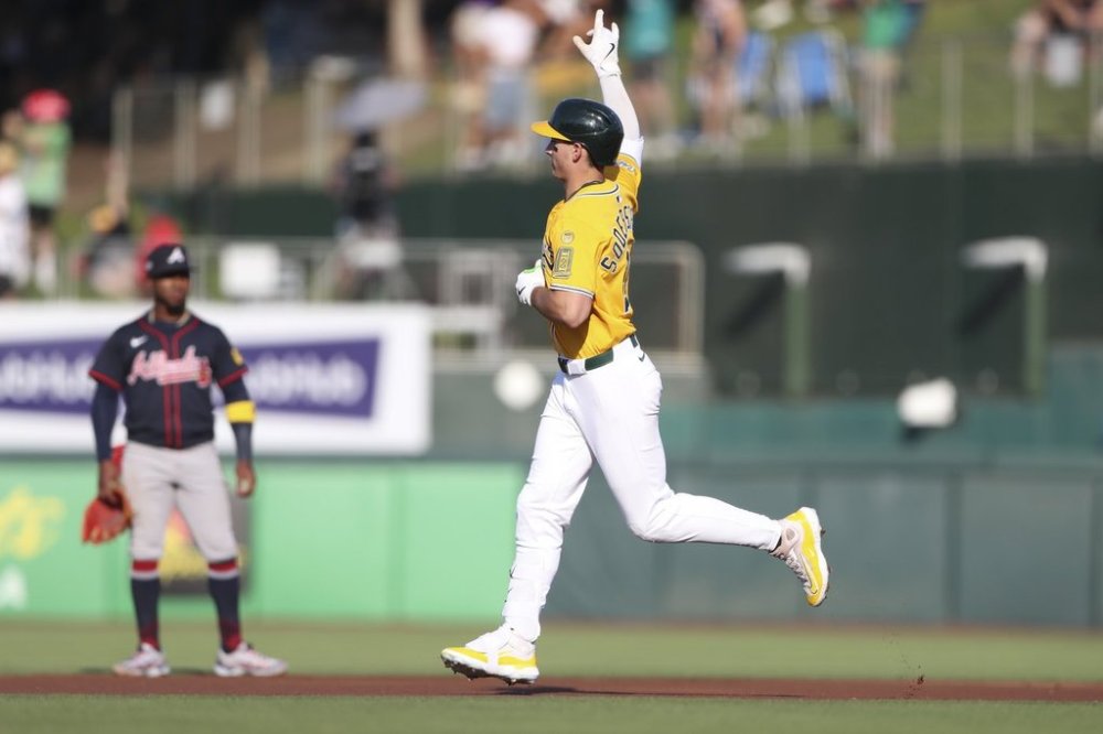 Athletics' Tyler Soderstrom jogs around the bases after hitting a three-run home run against the Atlanta Braves during the first inning of a baseball game Thursday, July 10, 2025, in West Sacramento, Calif. (AP Photo/Scott Marshall)