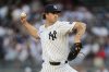 New York Yankees pitcher Cam Schlittler (31) throws during the first inning of a baseball game against the Seattle Mariners, Wednesday, July 9, 2025, in New York. (AP Photo/Yuki Iwamura)