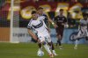 Vancouver Whitecaps defender Ranko Veselinović (4) and Colorado Rapids forward Calvin Harris (14) in the second half of an MLS soccer match Saturday, July 12, 2025, in Commerce City, Colo. (AP Photo/David Zalubowski)