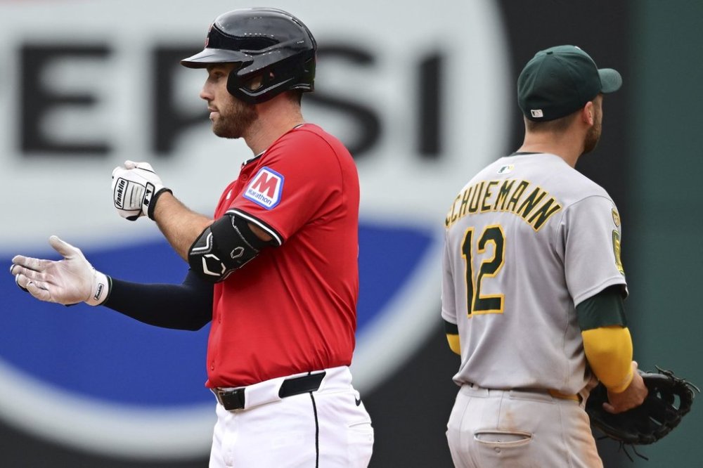 Cleveland Guardians' David Fry celebrates after hitting a three RBI double during the fourth inning of a baseball game against the Athletics, Sunday, July 20, 2025, in Cleveland. (AP Photo/David Dermer)