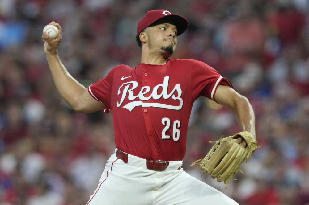 Cincinnati Reds pitcher Chase Burns throws during the second inning of a baseball game against the Los Angeles Dodgers, Monday, July 28, 2025, in Cincinnati. (AP Photo/Carolyn Kaster)