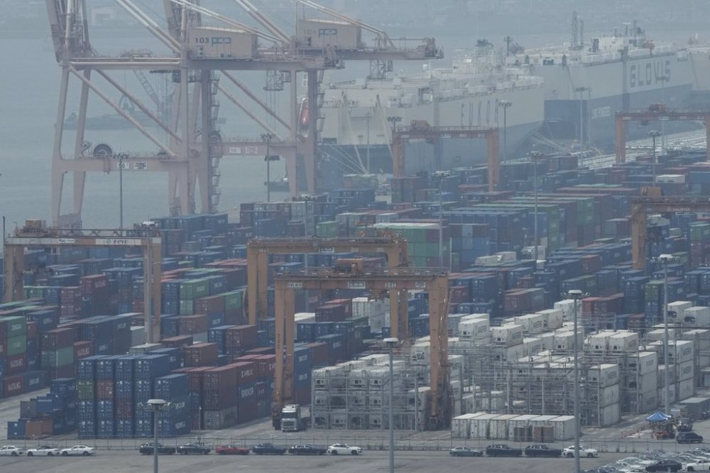 Cranes and shipping containers are seen at a port in Pyeongtaek, South Korea, Tuesday, July 8, 2025. (AP Photo/Ahn Young-joon)