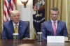 President Donald Trump, left, with Defense Secretary Pete Hegseth, right, during a cabinet meeting at the White House, Tuesday, July 8, 2025, in Washington. (AP Photo/Evan Vucci)