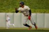Minnesota Twins' Byron Buxton runs from second base and scores against the Chicago Cubs on a Ryan Jeffers double in the first inning of a baseball game Tuesday, July 8, 2025, in Minneapolis. (AP Photo/Bruce Kluckhohn)