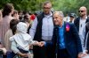 Prime Minister Mark Carney greets people during the Vancouver Pride Parade in Vancouver, on Sunday, August 3, 2025. THE CANADIAN PRESS/Ethan Cairns