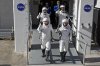 Astronauts, front row from left, Mike Fincke, of NASA, and Zena Cardman, of NASA, back row from left, Oleg Platonov, of Russia and Kimiya Yui, of Japan waves as they leave the Operations and Checkout Building for a trip the Kennedy Space Center's Launch Pad 39-A and a planned liftoff on a SpaceX Falcon 9 rocket Thursday, July 31, 2025, in Cape Canaveral , Fla. (AP Photo/John Raoux)