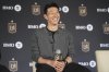 Son Heung-min, of South Korea, is introduced as a new member of Los Angeles FC during a press conference for the MLS soccer team Wednesday, Aug. 6, 2025, in Los Angeles. (AP Photo/Damian Dovarganes)