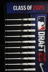 Specialized baseball bats are seen on display before the first round of the MLB baseball draft Sunday, July, 13, 2025 in Atlanta. (AP Photo/Mike Stewart)