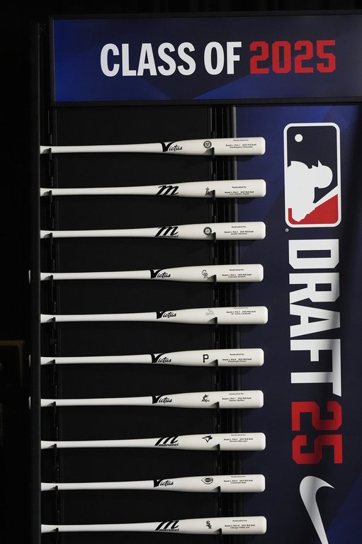 Specialized baseball bats are seen on display before the first round of the MLB baseball draft Sunday, July, 13, 2025 in Atlanta. (AP Photo/Mike Stewart)