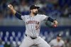 Houston Astros starting pitcher Jason Alexander (54) pitches in the first inning of a baseball game against the Miami Marlins, Monday, Aug. 4, 2025, in Miami. (AP Photo/Rebecca Blackwell)