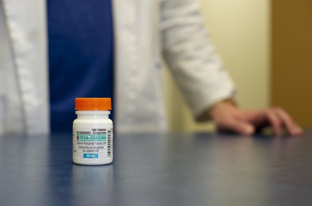 A bottle of codeine, an opiate used as a painkiller, is shown in a pharmacy in Regina, Sask., Friday, May 31, 2019. THE CANADIAN PRESS/Mark Taylor