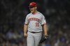 Cincinnati Reds closing pitcher Emilio Pagan celebrates after defeating the Chicago Cubs in a baseball game Monday, Aug. 4, 2025, in Chicago. (AP Photo/Paul Beaty)