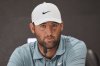 Scottie Scheffler speaks during a news conference after a practice round at the St. Jude Championship golf tournament Wednesday, Aug. 6, 2025, in Memphis, Tenn. (AP Photo/George Walker IV)