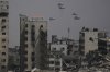 Humanitarian aid is airdropped to Palestinians over Gaza City, Gaza Strip, Monday, July 28, 2025. (AP Photo/Jehad Alshrafi)
