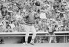 FILE - Chicago Cubs manager Lee Elia signals the bullpen to send in a right-hander during a game against the Atlanta Braves in Chicago, May 19, 1983. (AP Photo/Fred Jewel, File)