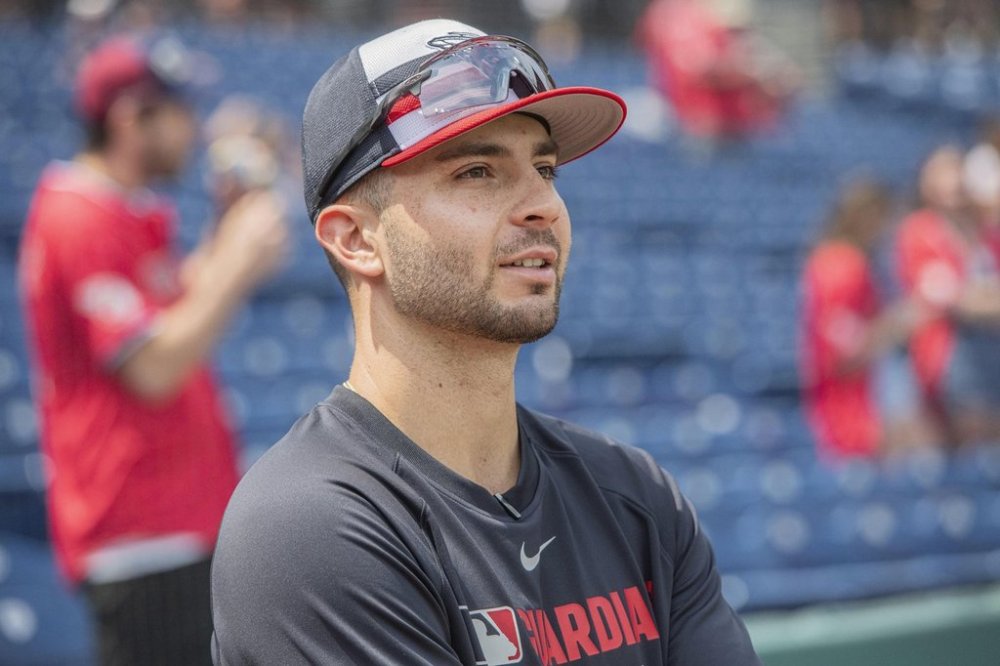 Cleveland Guardians' CJ Kayfus talks with reporters as he prepares for his major league debut before a baseball game against the Minnesota Twins, Saturday, Aug. 2, 2025, in Cleveland. (AP Photo/Phil Long)