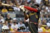 Pittsburgh Pirates' Oneil Cruz hits a two-run home run during the second inning of a baseball game against the Arizona Diamondbacks Saturday, July 26, 2025, in Pittsburgh. (AP Photo/Matt Freed)