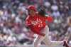 FILE - Cincinnati Reds relief pitcher Alexis Díaz works in the eighth inning of a baseball game, April 26, 2025, in Denver. (AP Photo/David Zalubowski, File)
