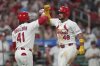 St. Louis Cardinals' Ivan Herrera (48) is congratulated by teammate Alec Burleson (41) after hitting a solo home run during the sixth inning of a baseball game against the San Diego Padres Thursday, July 24, 2025, in St. Louis. (AP Photo/Jeff Roberson)