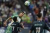 Austin FC forward Brandon Vázquez, facing, heads the ball against Seattle Sounders midfielder Cristian Roldan (7) during the second half of an MLS soccer match Saturday, June 28, 2025, in Seattle. (AP Photo/Lindsey Wasson)