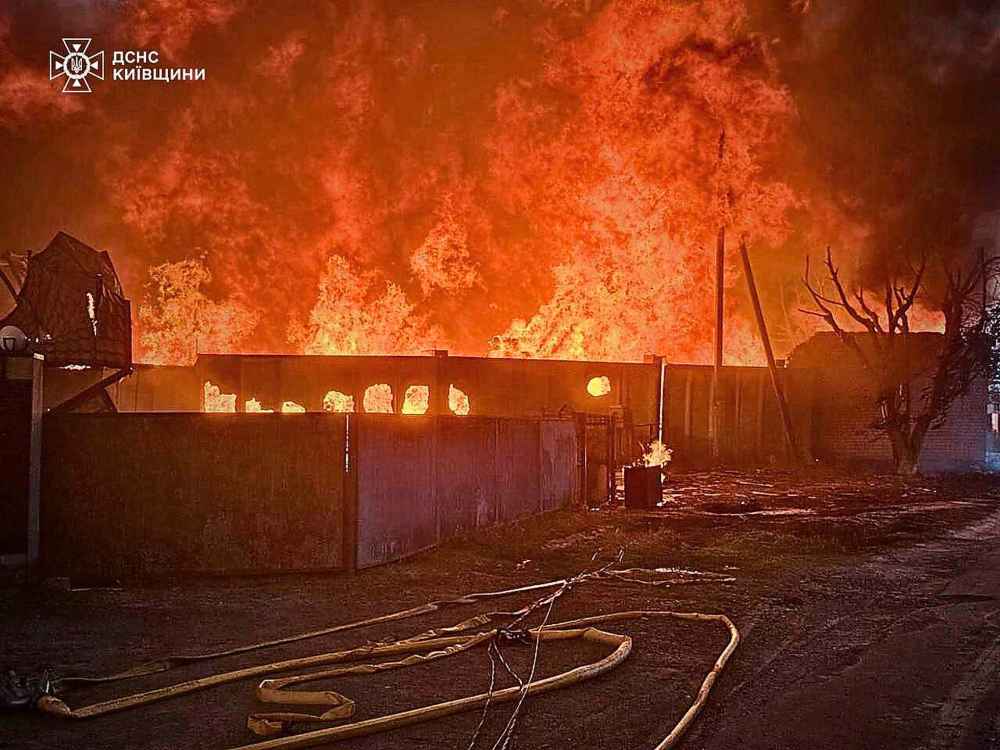 This photo provided by the Ukrainian Emergency Service shows a fire following a Russian attack in Kyiv region, Ukraine, Wednesday, July 9, 2025. (Ukrainian Emergency Service via AP)
