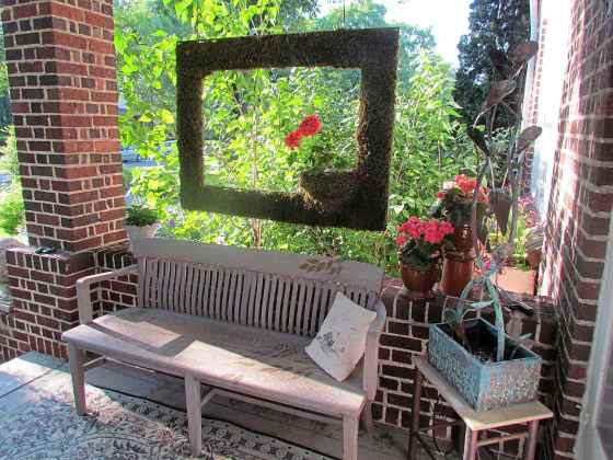 Create an illusion with a moss window frame. (Colleen Zacharias)