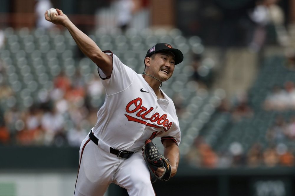Baltimore Orioles pitcher Tomoyuki Sugano throws during the first inning of a baseball game against the Colorado Rockies in Baltimore, Sunday, July 27, 2025. (AP Photo/Terrance Williams)