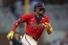 Atlanta Braves' Ronald Acuña Jr. runs to third base in the fourth inning of a baseball game against the New York Yankees, Friday, July 18, 2025, in Atlanta. (AP Photo/Colin Hubbard)