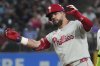 Philadelphia Phillies' Kyle Schwarber celebrates after hitting a double during the seventh inning of a baseball game against the Chicago White Sox in Chicago, Tuesday, July 29, 2025. (AP Photo/Nam Y. Huh)