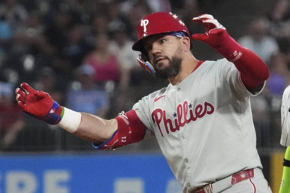 Philadelphia Phillies' Kyle Schwarber celebrates after hitting a double during the seventh inning of a baseball game against the Chicago White Sox in Chicago, Tuesday, July 29, 2025. (AP Photo/Nam Y. Huh)