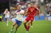 England's Maya Le Tissier, right, vies for the ball with England's Lucy Bronze during the Women's Euro 2025 final soccer match between England and Spain at St. Jakob-Park in Basel, Switzerland, Sunday, July 27, 2025. (AP Photo/Alessandra Tarantino)