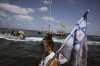 Relatives of Israeli hostages held by Hamas sail along the coast of the Israeli southern city of Ashkelon towards the Gaza Strip, in a protest demanding their release from captivity and calling for an end to the war, Thursday, Aug. 7, 2025. (AP Photo/Leo Correa)