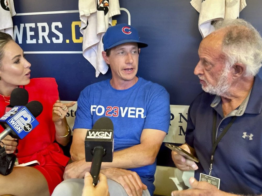 Chicago Cubs manager Craig Counsell speaks to reporters while wearing a T-shirt honoring Hall of Fame Ryne Sandberg on Tuesday in Milwaukee. (AP Photo/Steve Megargee)