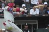 Philadelphia Phillies' Brandon Marsh hits a double during the second inning of a baseball game against the Chicago White Sox in Chicago, Tuesday, July 29, 2025. (AP Photo/Nam Y. Huh)