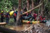 Firefighters from Ciudad Acuña, Mexico, load a body into a raft as they prepare for a water recovery along the Guadalupe River days after a flash flood swept through the area, in Ingram, Texas, Monday, July 7, 2025. THE CANADIAN PRESS/AP-Eli Hartman