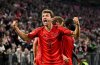 FILE - Munich's Thomas Muller celebrates a 1-0 win in a German Bundesliga soccer match between FC Bayern Munich and VfB Stuttgart, in Munich, Germany, Saturday, Oct. 19, 2024. (Tom Weller/dpa via AP, File)