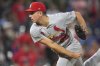 St. Louis Cardinals starting pitcher Michael McGreevy works against the Colorado Rockies in the seventh inning of a baseball game Monday, July 21, 2025, in Denver. (AP Photo/David Zalubowski)