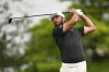 Max Homa hits from the 10th tee during the first round of the 3M Open golf tournament at the Tournament Players Club Thursday, July 24, 2025, in Blaine, Minn. (AP Photo/Abbie Parr)