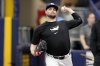 FILE - Tampa Bay Rays pitcher Shane McClanahan throws in the bullpen before a baseball game between the Rays and the Baltimore Orioles on Aug. 10, 2024, in St. Petersburg, Fla. (AP Photo/Chris O'Meara, File)