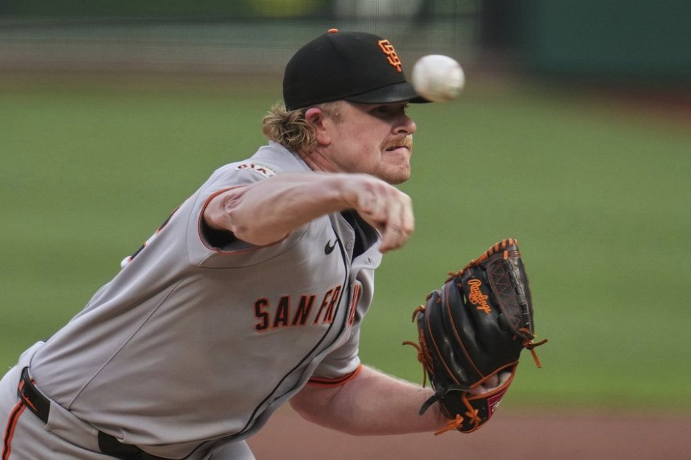 San Francisco Giants pitcher Logan Webb delivers during the first inning of a baseball game against the Pittsburgh Pirates in Pittsburgh, Tuesday, Aug. 5, 2025. (AP Photo/Gene J. Puskar)