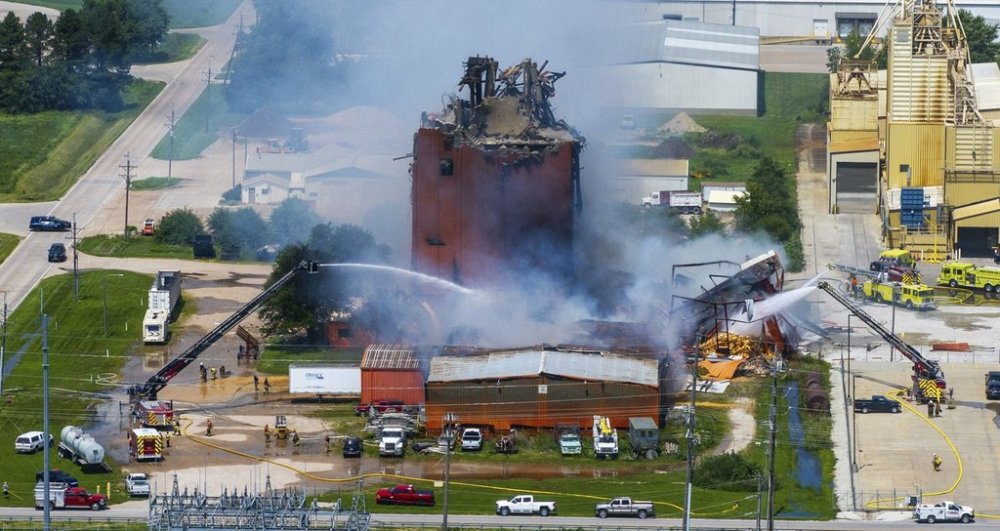 Firefighters battle a fire after an explosion in an industrial area in Fremont, Neb., Tuesday, July 29, 2025. (Chris Machian/Omaha World-Herald via AP)