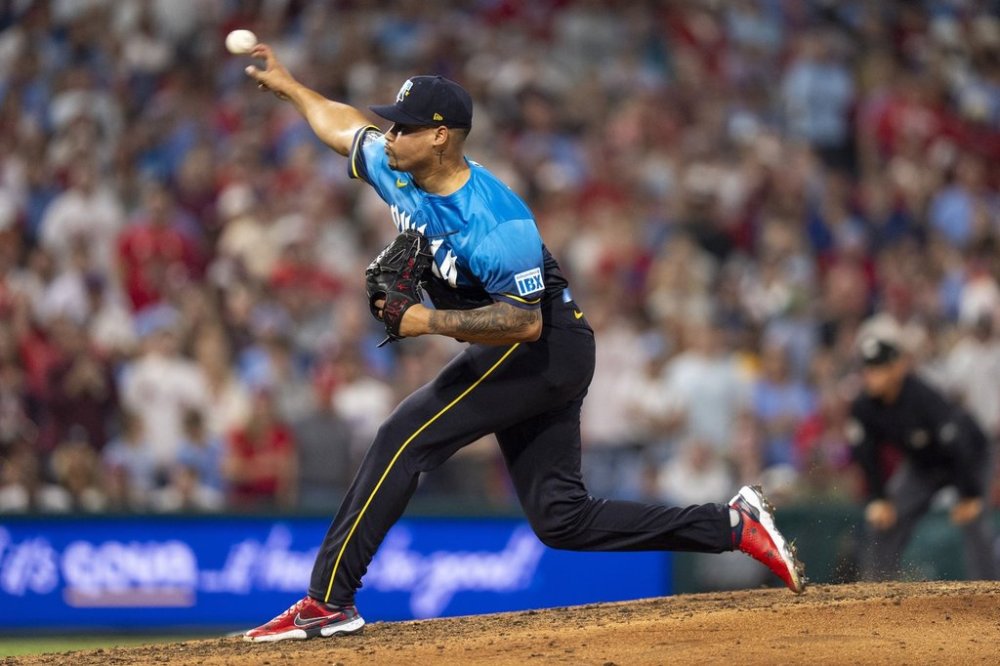 Philadelphia Phillies relief pitcher Jhoan Duran delivers during the ninth inning of a baseball game against the Detroit Tigers, Friday, Aug. 1, 2025, in Philadelphia. (AP Photo/Chris Szagola)
