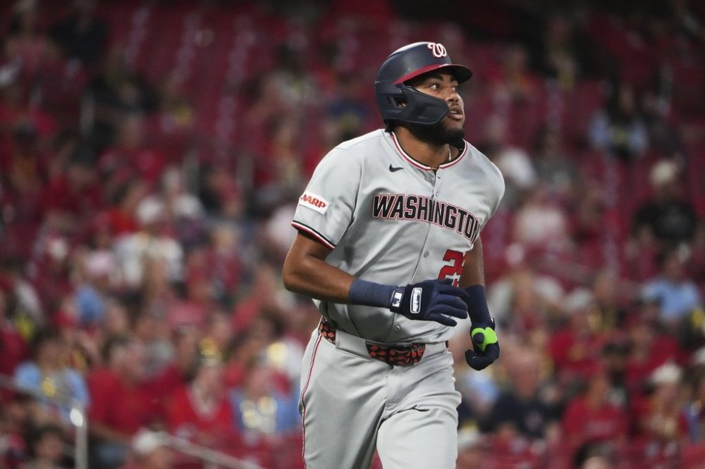Washington Nationals' James Wood watches his solo home run during the seventh inning of a baseball game against the St. Louis Cardinals Wednesday, July 9, 2025, in St. Louis. (AP Photo/Jeff Roberson)