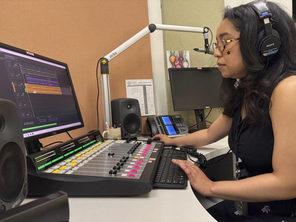Elayna Cunningham, a college student interning at Koahnic Broadcast Corp., records a program on July 10, 2025, at the Anchorage, Alaska, studios of KNBA, the flagship station for National Native News. (AP Photo/Mark Thiessen)