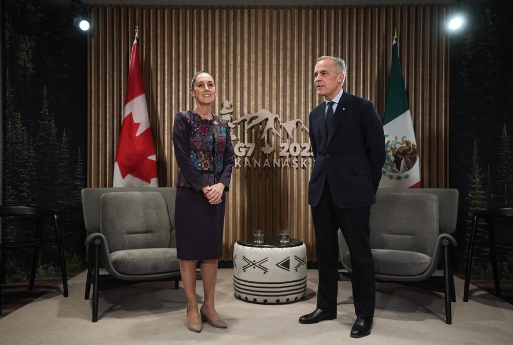 Mexican President Claudia Sheinbaum, left, speaks before a meeting with Prime Minister Mark Carney at the G7 Summit in Kananaskis, Alta., on Tuesday, June 17, 2025. THE CANADIAN PRESS/Darryl Dyck