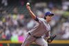 Texas Rangers starting pitcher Jacob deGrom throws against the Seattle Mariners during the first inning of a baseball game Sunday, Aug. 3, 2025, in Seattle. (AP Photo/Lindsey Wasson)