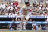 Boston Red Sox Trevor Story watches his two run home run against the Minnesota Twins during the third inning of baseball game Tuesday, July 29, 2025, in Minneapolis. (AP Photo/Matt Krohn)