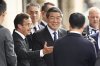Swedish prime minister Ulf Kristersson, center left, gestures as he greets Chinese vice prime minister He Lifeng, center, at Rosenbad before trade talks between the US and China in Stockholm, Sweden, July 28, 2025. (Fredrik Sandberg/TT News Agency via AP)