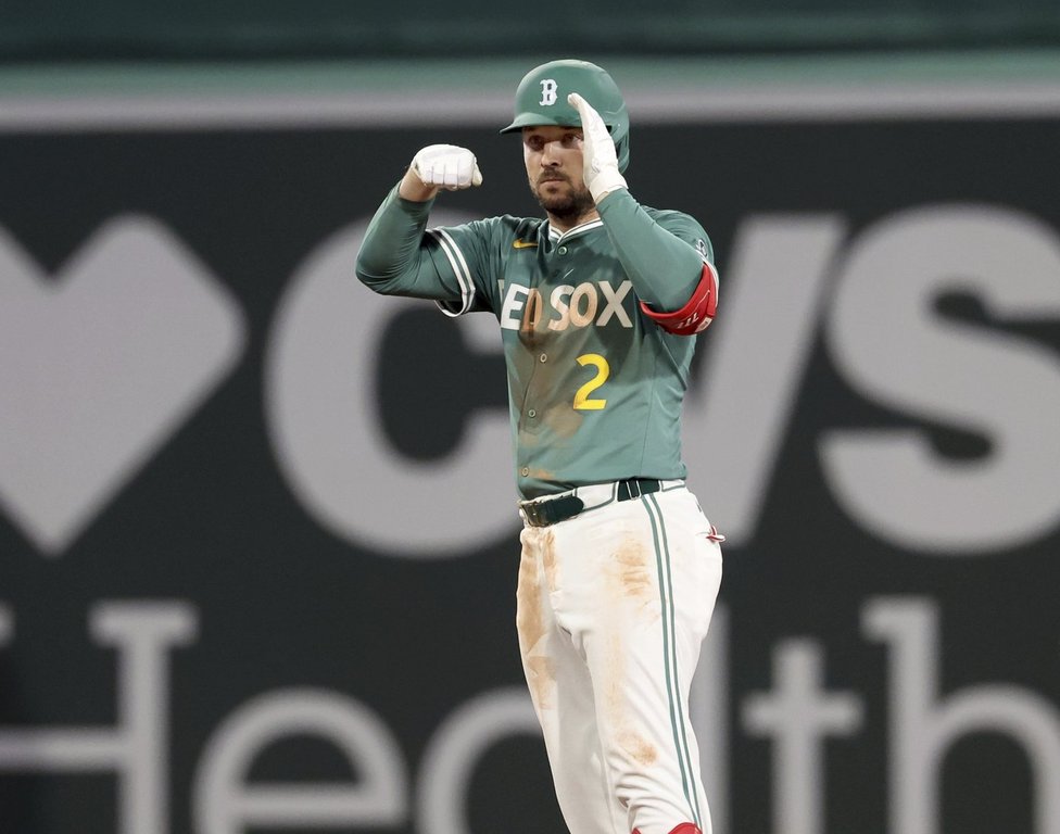Boston Red Sox's Alex Bregman gestures after hitting an infield double during the seventh inning of a baseball game against the Tampa Bay Rays, Friday, July 11, 2025, in Boston. (AP Photo/Mark Stockwell)