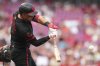 Cincinnati Reds' Tyler Stephenson hits a solo home run during the second inning of a baseball game against the Tampa Bay Rays, Friday, July 25, 2025, in Cincinnati. (AP Photo/Jeff Dean)